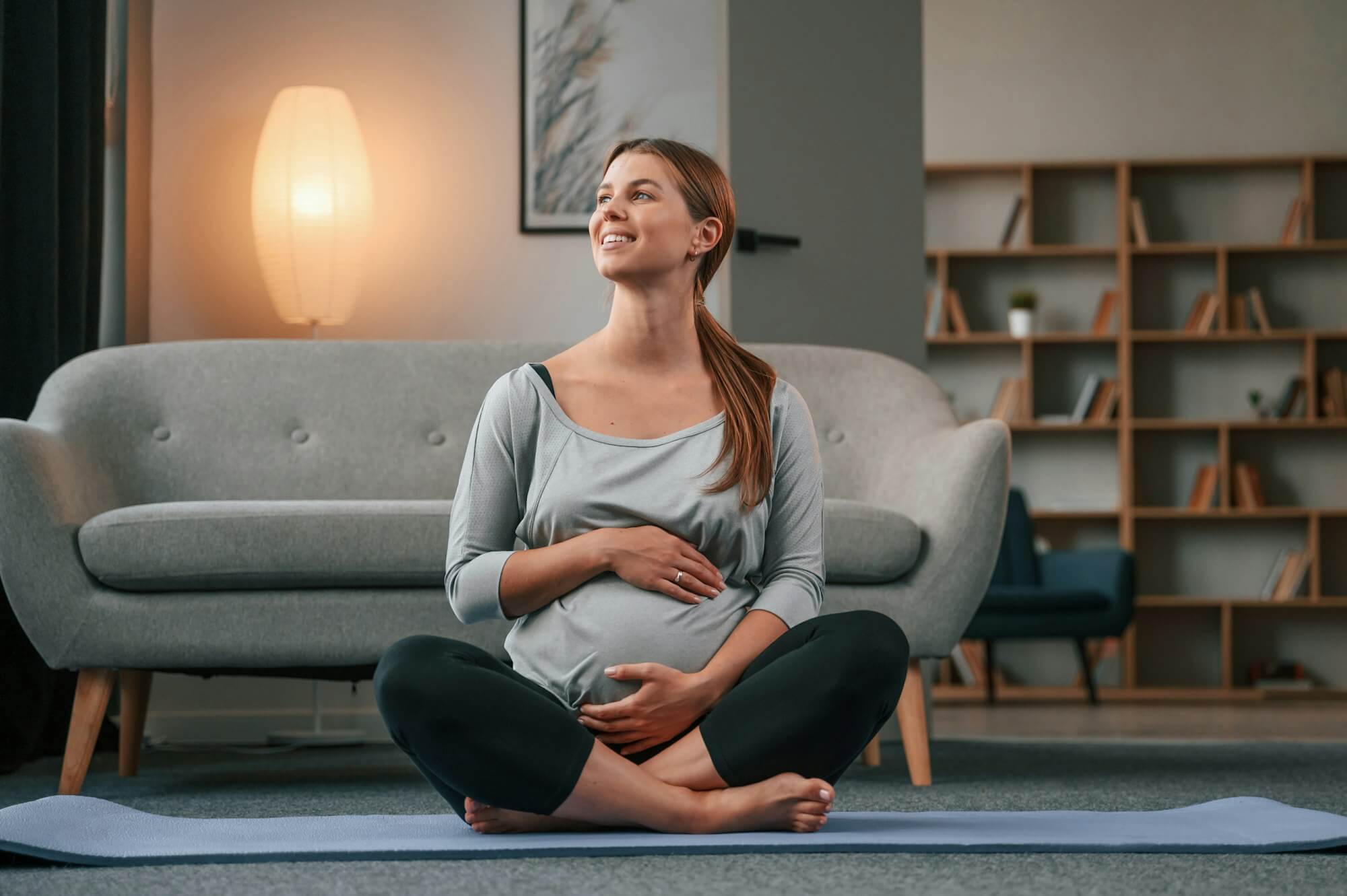 Pregnant woman practicing yoga